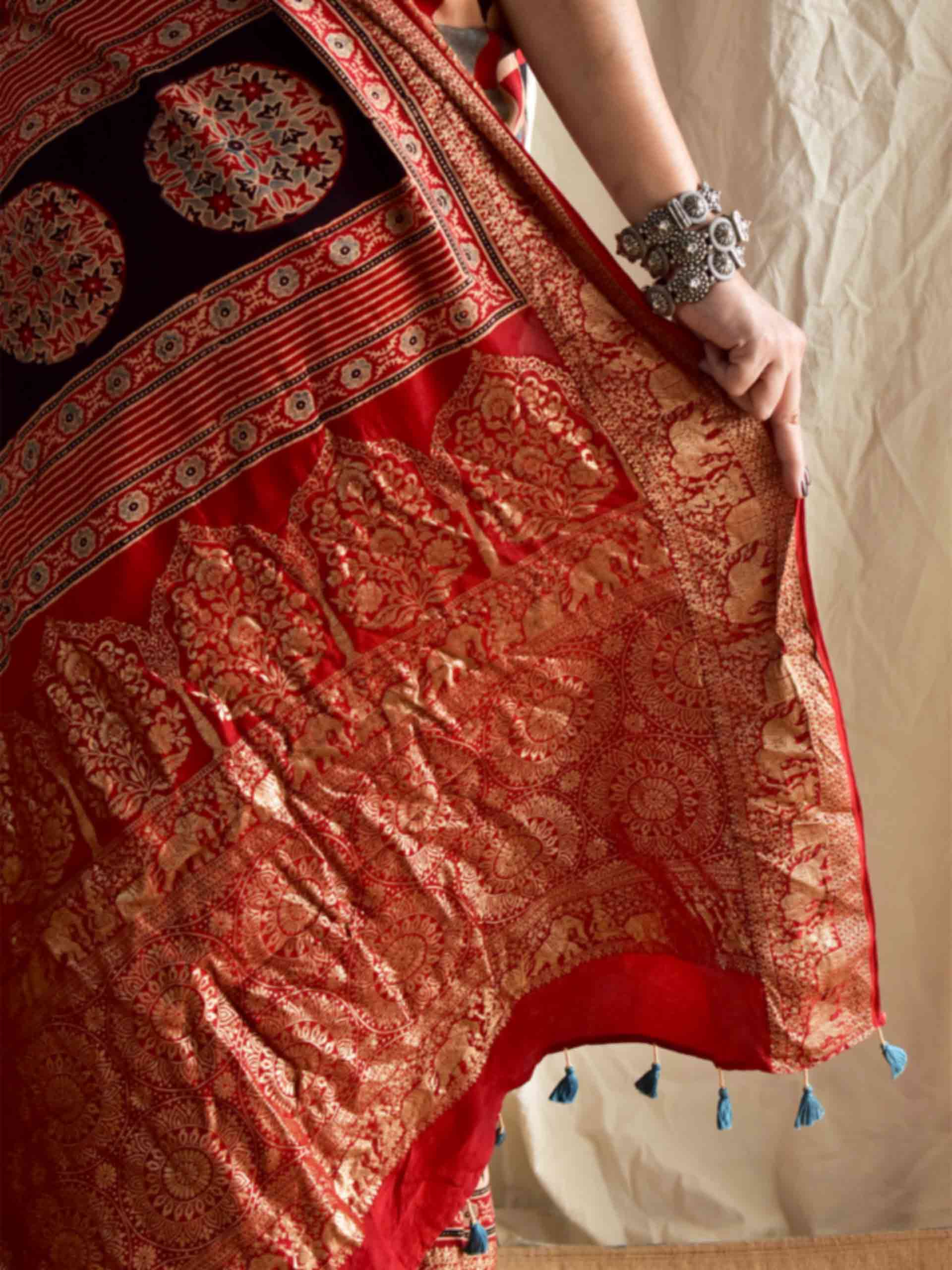 Khwahish - Ajrakh hand block printed Dola Silk zari border Saree