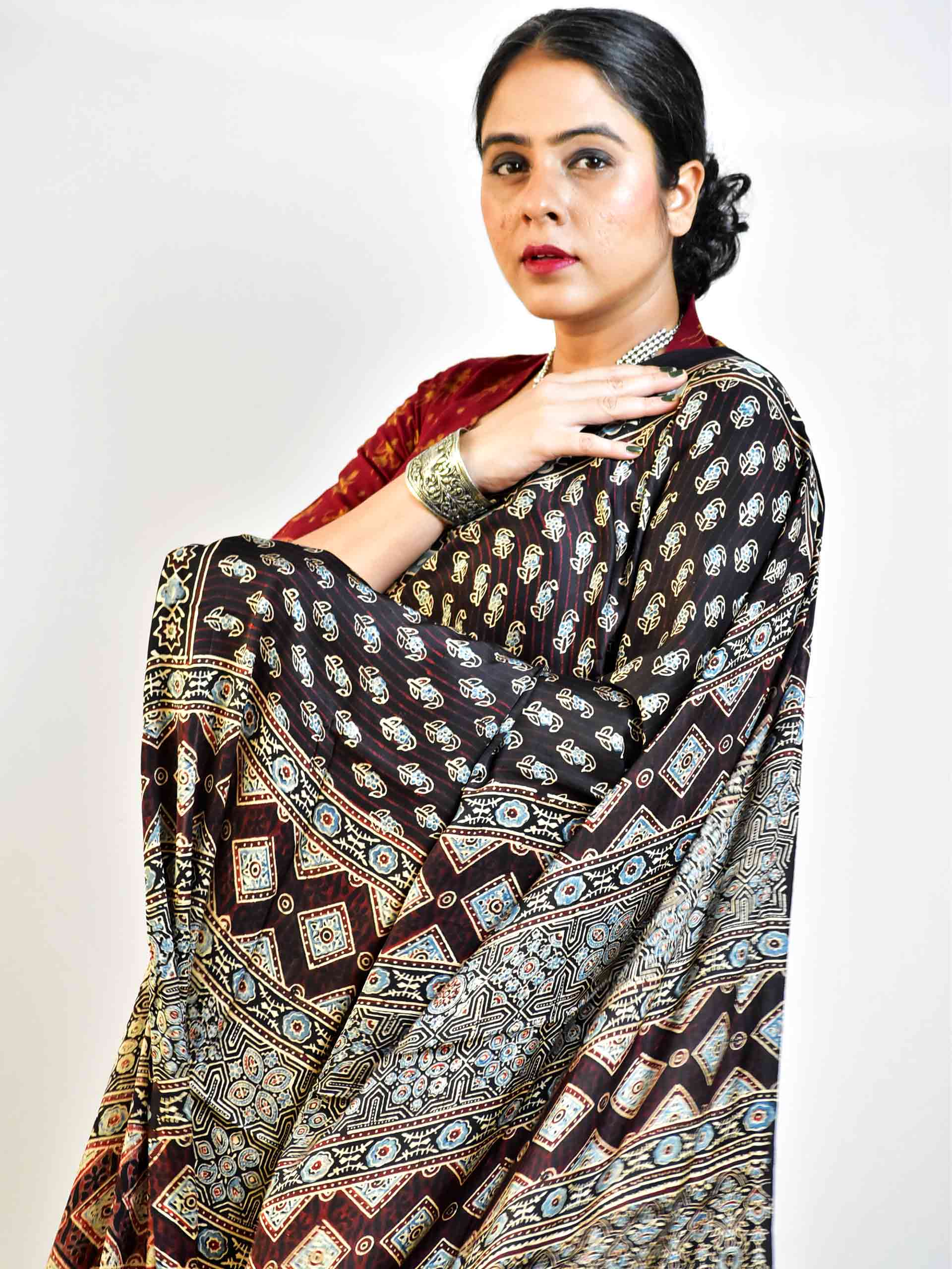 Ajrakh hand block printed Modal Silk Saree with zari pallu
