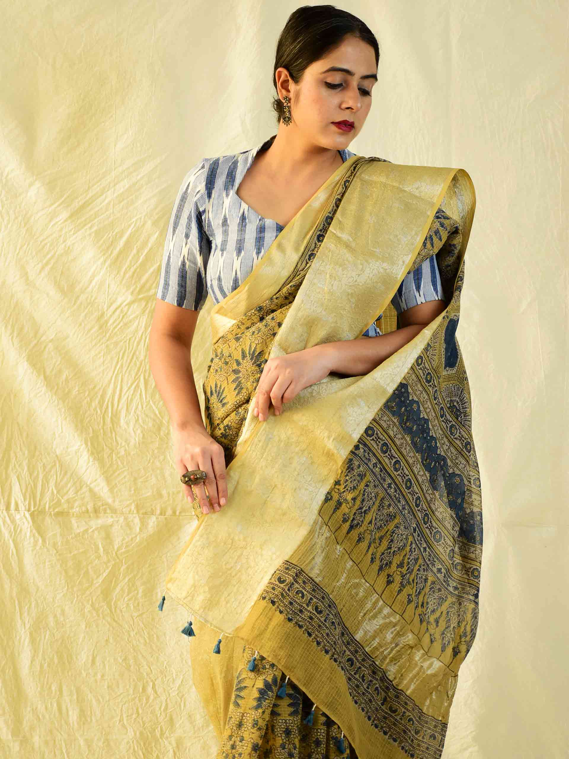 Ajrakh handloom Kota Doria saree with zari border