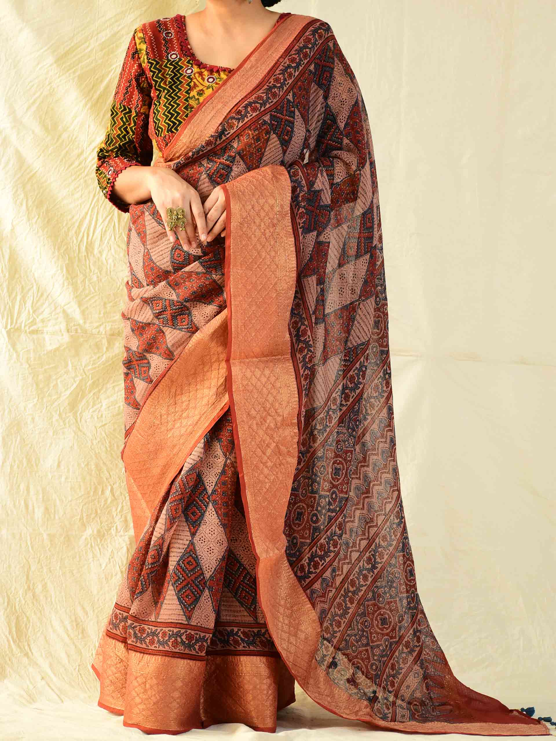 Ajrakh handloom Kota Doria saree with zari border