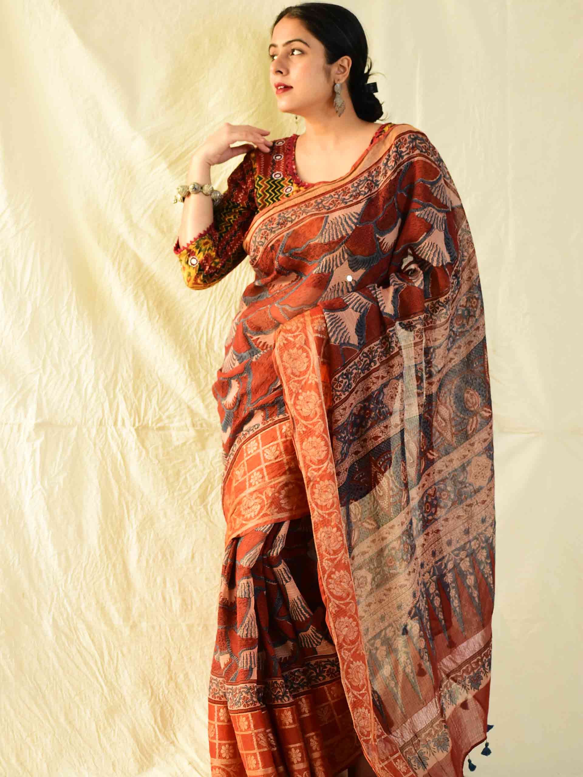 Buy Ajrakh handloom Kota Doria saree with zari border