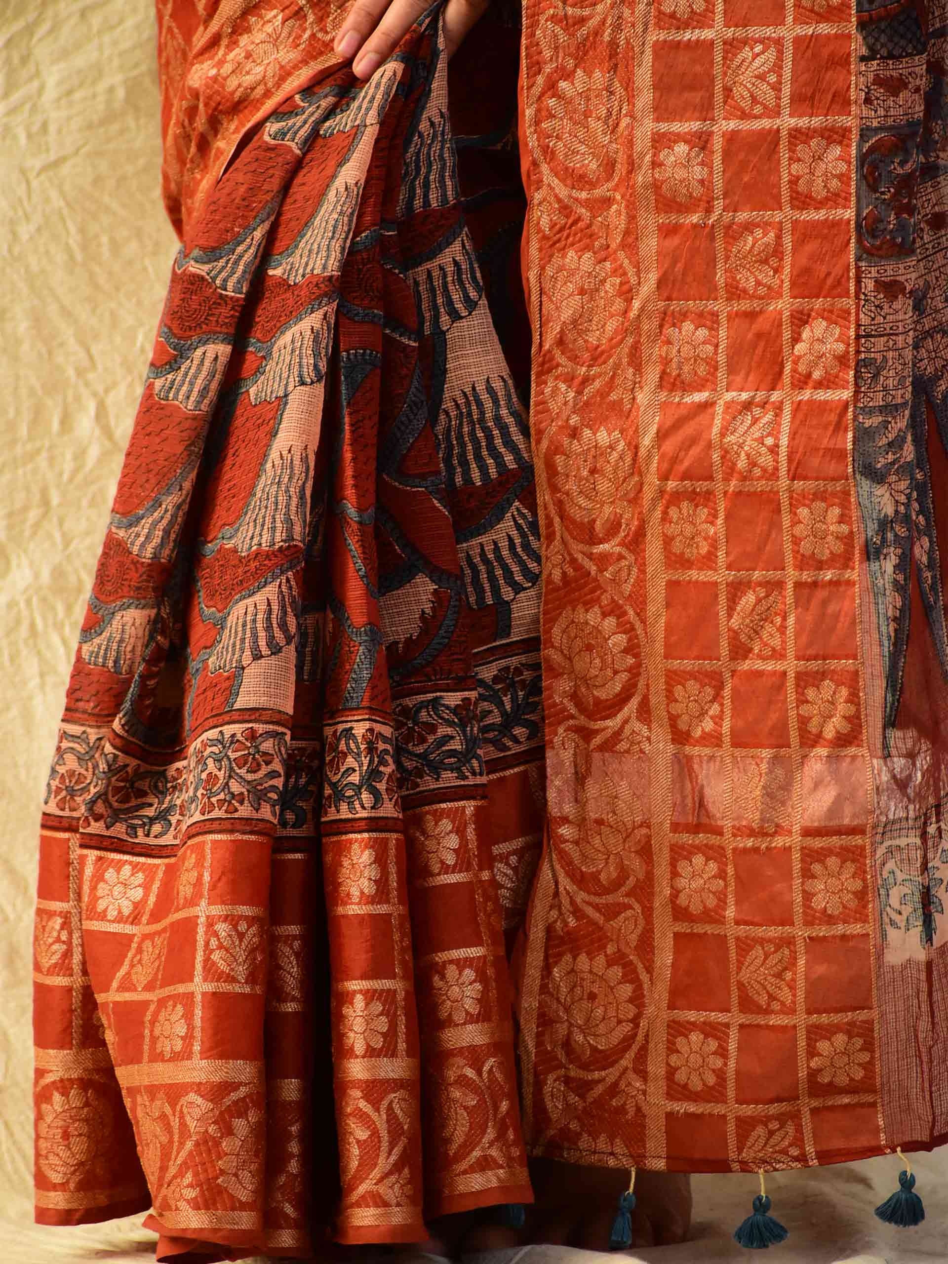 Buy Ajrakh handloom Kota Doria saree with zari border